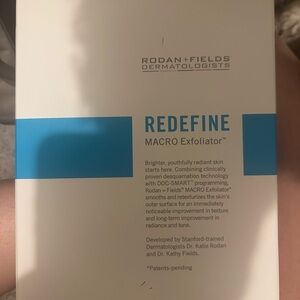 Rodan + Fields White and Blue Skincare Tool